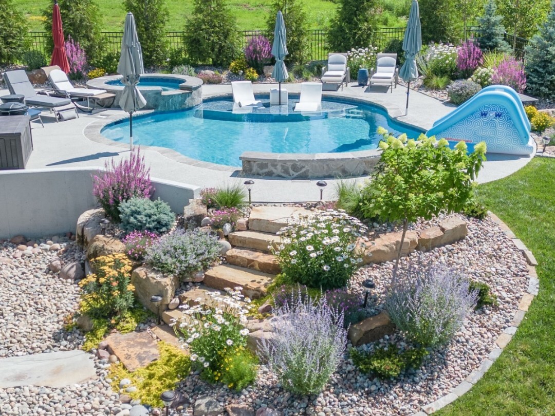 pool with nice landscaping