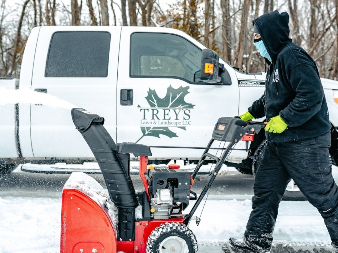 Man with a snowblower