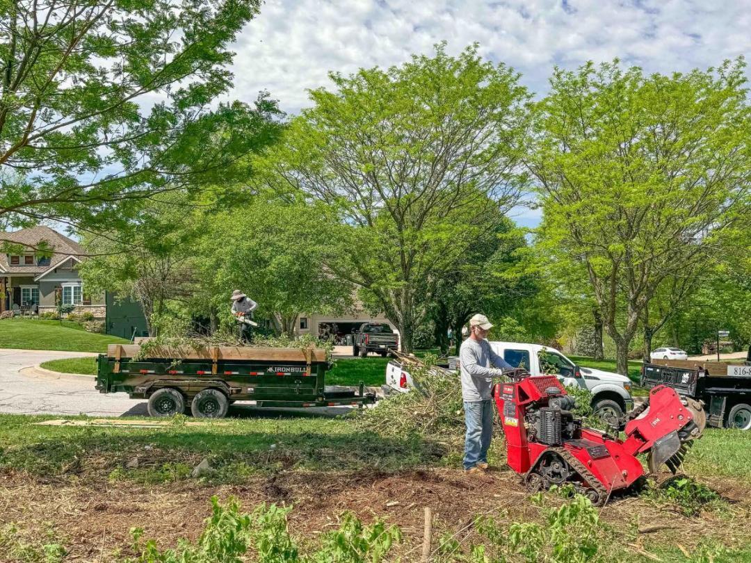 Trey's Lawn & Landscape - Check Out This Amazing Backyard By Expert Kansas City Patio Contractors Fire Pit