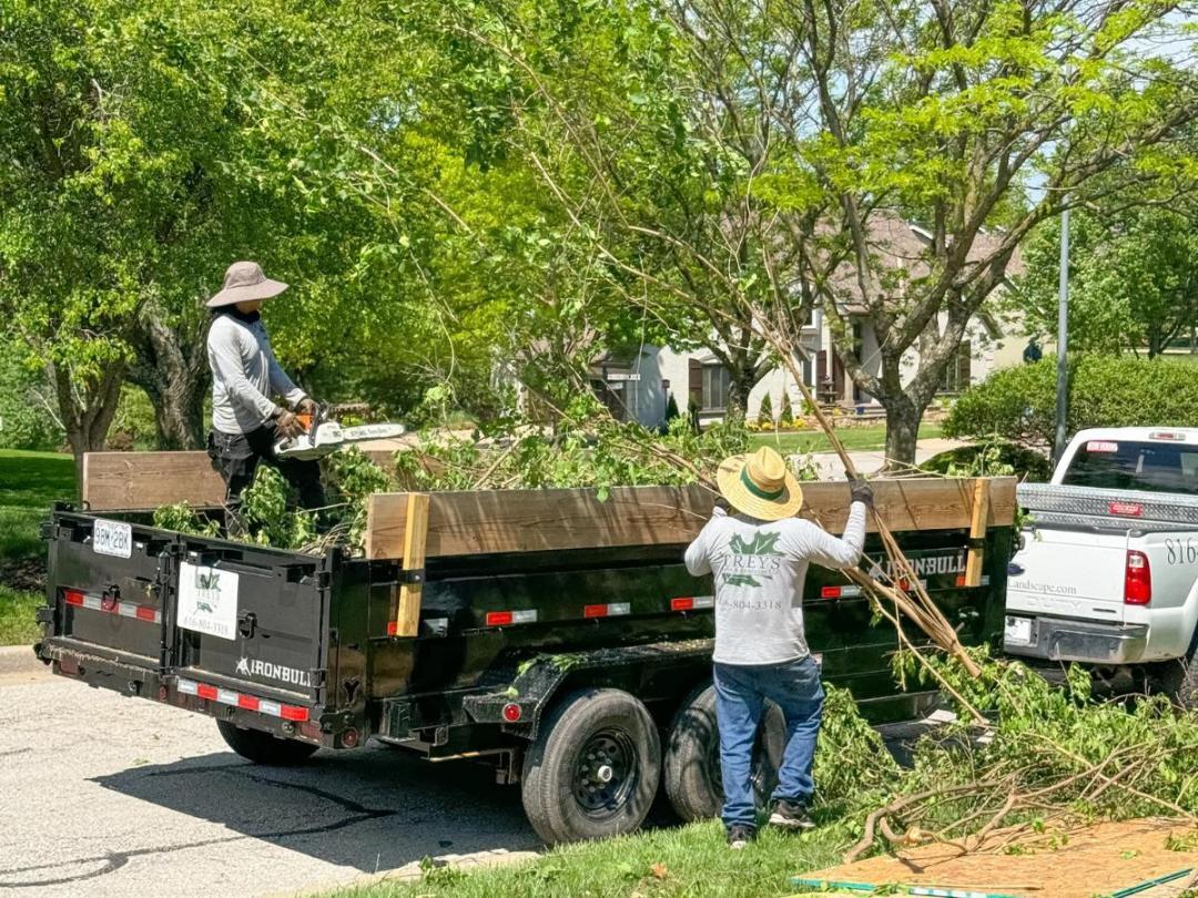 Trey's Lawn & Landscape - Check Out This Amazing Backyard By Expert Kansas City Patio Contractors Fire Pit