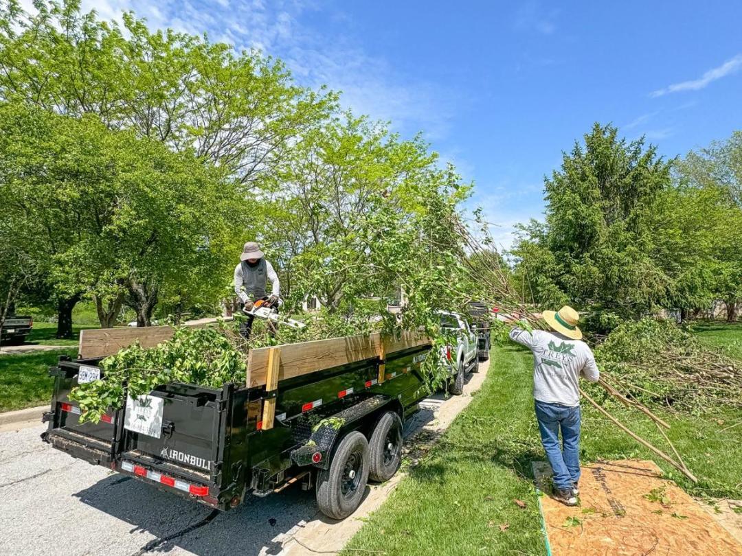 Trey's Lawn & Landscape - Check Out This Amazing Backyard By Expert Kansas City Patio Contractors Fire Pit